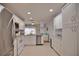 Modern kitchen with white cabinets, stainless steel appliances, and granite counters at 189 Carlisle Nw Ave, Port Charlotte, FL 33952