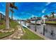 Private boat dock with lift and kayak on the canal at 189 Carlisle Nw Ave, Port Charlotte, FL 33952