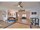 Bright living room with hardwood floors, comfy seating, and built-in shelving at 189 Carlisle Nw Ave, Port Charlotte, FL 33952