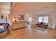 Bright living room with hardwood floors, stylish furniture, and natural light at 189 Carlisle Nw Ave, Port Charlotte, FL 33952