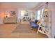 Spacious living room with hardwood floors, neutral walls, and ample natural light at 189 Carlisle Nw Ave, Port Charlotte, FL 33952