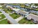 Aerial view showcasing home's location and canal views at 189 Carlisle Nw Ave, Port Charlotte, FL 33952