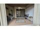 Covered patio with ceiling fan and outdoor furniture at 24412 Lakeview Pl, Punta Gorda, FL 33980