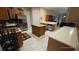 Modern kitchen with stainless steel appliances and an island at 24412 Lakeview Pl, Punta Gorda, FL 33980
