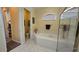 Relax in this spa-like bathroom, featuring a soaking tub and walk-in shower at 24412 Lakeview Pl, Punta Gorda, FL 33980