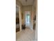 Inviting entryway with glass door and tile flooring at 24412 Lakeview Pl, Punta Gorda, FL 33980