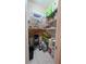 Well-organized pantry with ample shelving for storage at 24412 Lakeview Pl, Punta Gorda, FL 33980