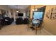 Casual dining area with glass-top table and seating for four at 24412 Lakeview Pl, Punta Gorda, FL 33980