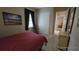 Spacious bedroom with a double bed and built-in closet at 24412 Lakeview Pl, Punta Gorda, FL 33980