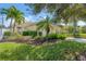 Beautiful home with lush landscaping and a two-car garage at 28108 Pablo Picasso Dr, Englewood, FL 34223