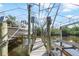 Covered boat lift with a walkway, providing convenient access at 300 E Bay Heights Rd, Englewood, FL 34223