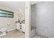 Bathroom with walk-in shower, vanity with storage, and a toilet at 3075 Bay Oaks Cir, Englewood, FL 34223