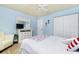 Bedroom with a full-size bed and built-in dresser at 3075 Bay Oaks Cir, Englewood, FL 34223