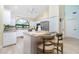 Modern kitchen with stainless steel appliances and granite countertops at 3075 Bay Oaks Cir, Englewood, FL 34223