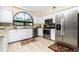 Well-equipped kitchen featuring stainless steel appliances at 3075 Bay Oaks Cir, Englewood, FL 34223