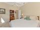 Cozy bedroom with a double bed and bookcase at 3335 Pennyroyal Rd, Port Charlotte, FL 33953