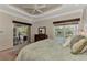 Main bedroom with sliding doors leading to the pool area at 3377 Pennyroyal Rd, Port Charlotte, FL 33953