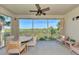 Relaxing screened balcony with outdoor seating and scenic preserve views at 3393 Grand Vista Ct # 201, Port Charlotte, FL 33953