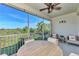 This screened balcony boasts a view and a ceiling fan at 3393 Grand Vista Ct # 201, Port Charlotte, FL 33953