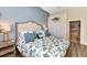 Spacious bedroom with king-size bed, and ensuite bathroom at 3393 Grand Vista Ct # 201, Port Charlotte, FL 33953