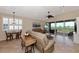 Spacious living room with patio access and view at 3393 Grand Vista Ct # 201, Port Charlotte, FL 33953