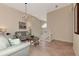 Upper level sitting area with sofas and a tiled floor at 3393 Grand Vista Ct # 201, Port Charlotte, FL 33953