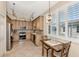 Modern kitchen with stainless steel appliances and light wood cabinets at 3393 Grand Vista Ct # 201, Port Charlotte, FL 33953
