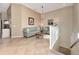Upper level sitting area with sofas and a tiled floor at 3393 Grand Vista Ct # 201, Port Charlotte, FL 33953