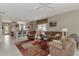 Open concept living room with view of kitchen and entryway at 3394 Osprey Ln, Port Charlotte, FL 33953