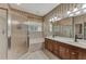 Double vanity bathroom with soaking tub and walk-in shower at 3394 Osprey Ln, Port Charlotte, FL 33953