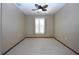 Bright bedroom with carpeted floors and ceiling fan at 412 Cypress Forest Dr, Englewood, FL 34223