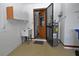 Garage with utility sink and laundry hookups at 412 Cypress Forest Dr, Englewood, FL 34223