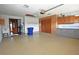 Spacious garage with extra storage at 412 Cypress Forest Dr, Englewood, FL 34223