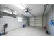 Attached garage with space for storage and a garage door opener at 43 Mark Twain Ln, Rotonda West, FL 33947