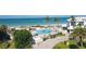 Resort-style pool area with beach access, offering a relaxing coastal lifestyle at 5000 Gasparilla Rd # Dc102, Boca Grande, FL 33921
