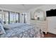 Spacious bedroom with king bed, ocean view, and built-in dresser at 5000 Gasparilla Rd # Dc102, Boca Grande, FL 33921