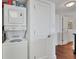 Stackable washer and dryer in a compact laundry closet at 5000 Gasparilla Rd # Dc102, Boca Grande, FL 33921