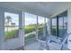 Private screened porch overlooking lush landscaping at 5000 Gasparilla Rd # Dc102, Boca Grande, FL 33921