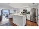 Modern kitchen with stainless steel appliances and island at 5000 Gasparilla Rd # Dc102, Boca Grande, FL 33921