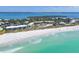 Aerial showing beachfront property, ocean, and white sand beach at 5000 Gasparilla Rd # Dc102, Boca Grande, FL 33921