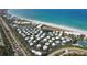 Aerial view of community near beach, pool, and tennis courts at 5000 Gasparilla Rd # Dc102, Boca Grande, FL 33921
