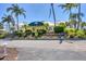 Building exterior showcasing landscaping and architecture at 5000 Gasparilla Rd # Dc102, Boca Grande, FL 33921