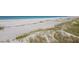 Pathway to the beach with dunes and vegetation at 5000 Gasparilla Rd # Dc102, Boca Grande, FL 33921