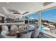 Elegant beachfront dining room with ocean views and pool views at 5000 Gasparilla Rd # Dc102, Boca Grande, FL 33921