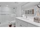 Bright bathroom with vanity, walk-in shower, and elegant finishes at 5000 Gasparilla Rd # Dc102, Boca Grande, FL 33921