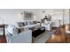 Spacious living room with hardwood floors and comfy sofas at 5000 Gasparilla Rd # Dc102, Boca Grande, FL 33921