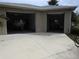 Two-car garage with boat and additional storage space at 5105 Ackley Ter, Port Charlotte, FL 33981