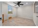 Bright and airy garage room with tile flooring at 5208 Churchill Rd, Port Charlotte, FL 33981