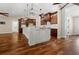 Two-island kitchen with stainless steel appliances and hardwood floors at 5208 Churchill Rd, Port Charlotte, FL 33981