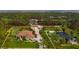 Beautiful aerial view of the property showcasing its mature landscaping and desirable location at 5208 Churchill Rd, Port Charlotte, FL 33981